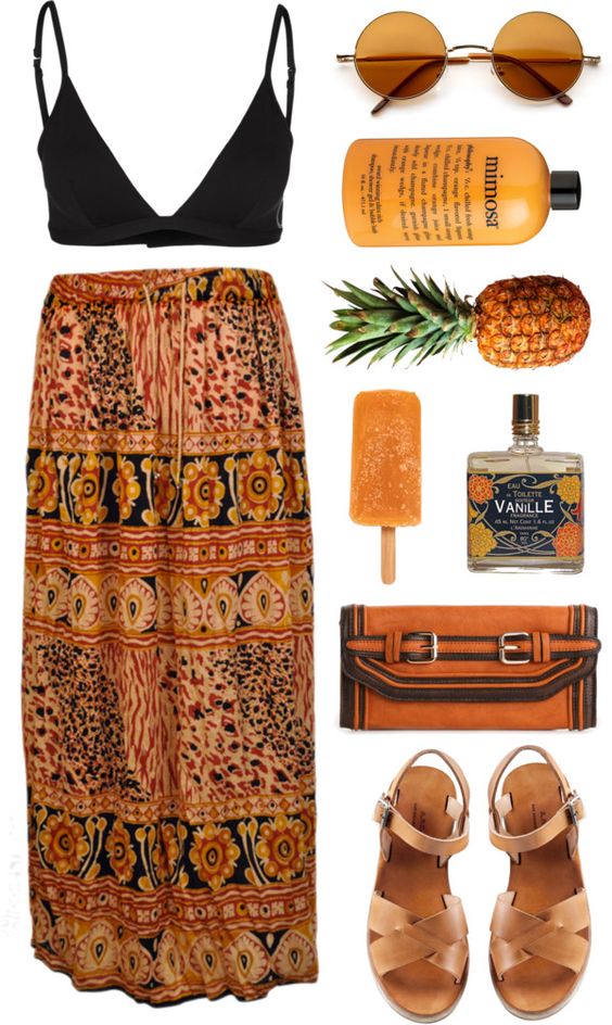 На фото: модный лук для знойного лета - юбка , топ, сандали, очки.